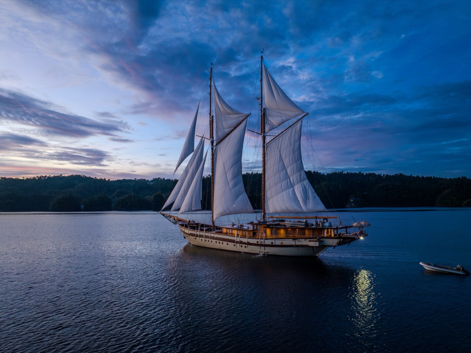 A classic schooner under sail in a southern reach.